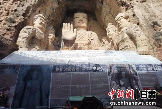 時下，中國“石窟鼻祖”天梯山石窟第13窟大佛足部與局部危巖體搶救性保護項目正在施工。圖為施工現(xiàn)場。陳曉斌 攝